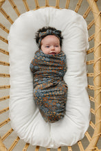 Load image into Gallery viewer, Navy Floral Bamboo Stretch Swaddle
